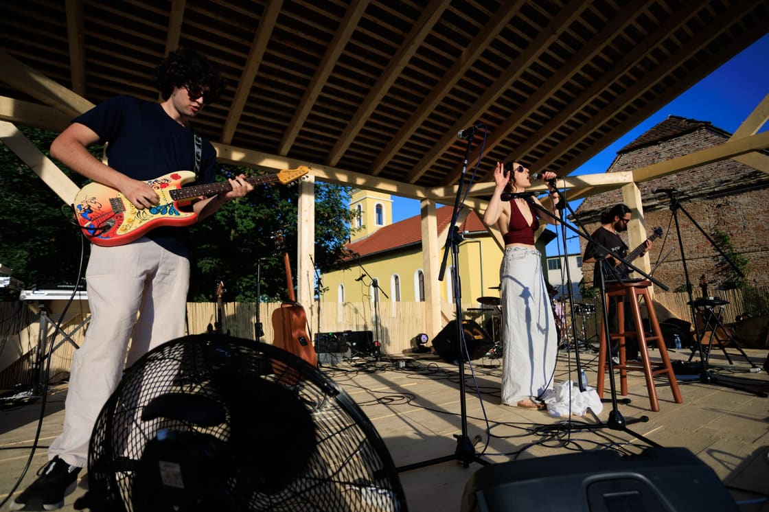 MoonGroove playing a full set outdoors under a timber canopy